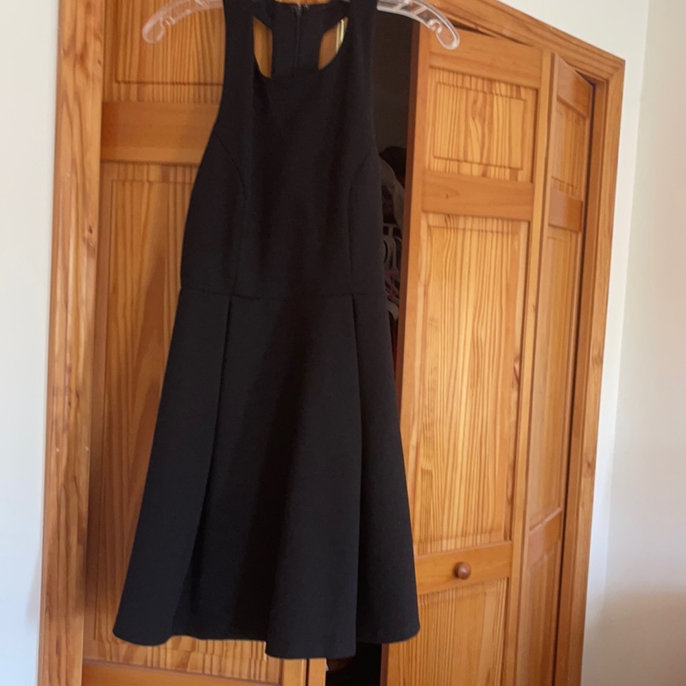 Size medium black party dress. Worn once in great condition